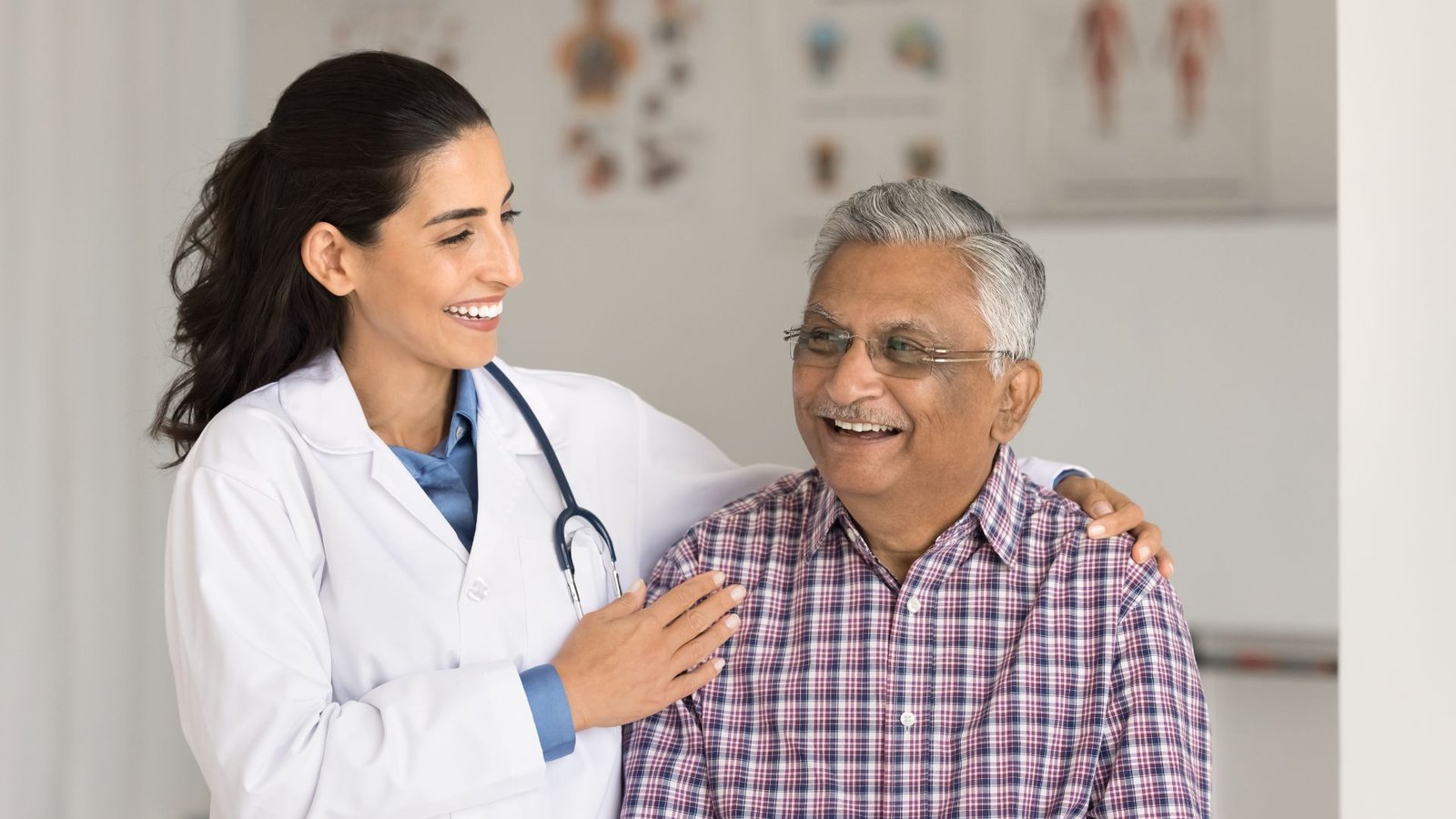 A doctor providing a consultation to a patient in a home setting