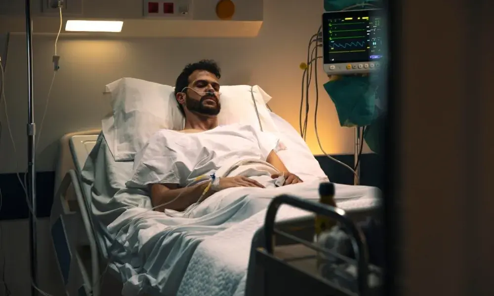 A professional home ICU setup with a nurse tending to a patient