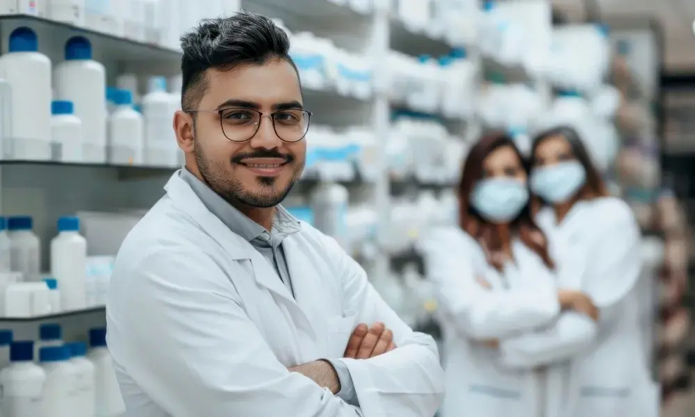 A pharmacist professionally dispensing medicine in a medical setting