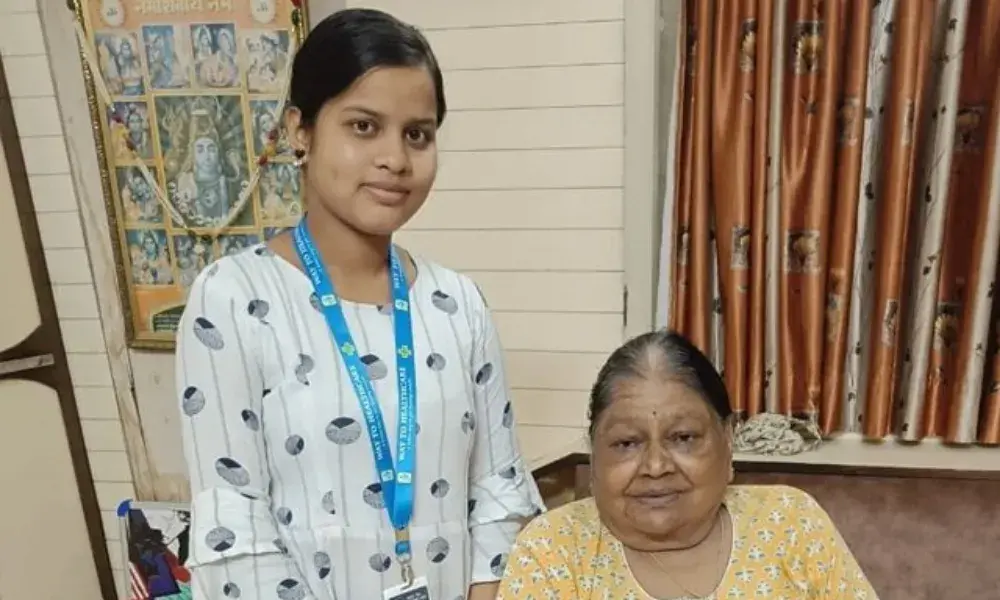 A home nurse providing care to a senior patient
